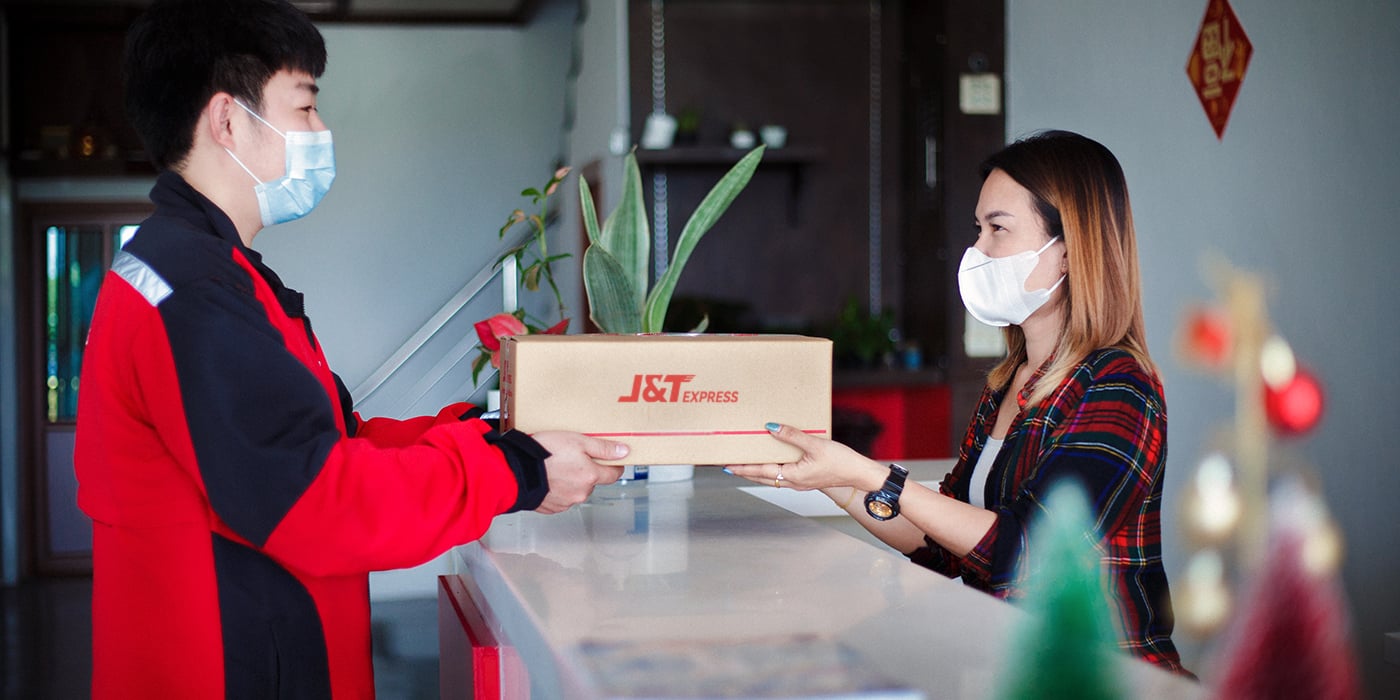 J&T delivering parcel